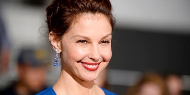 Ashley Judd poses on the red carpet.