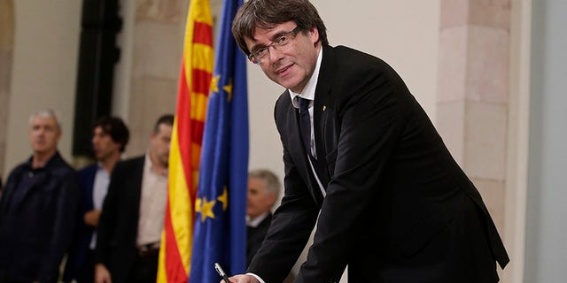 Catalan regional President Carles Puigdemont signed an independence declaration, however, he proposed suspending it to allow for dialogue with the Spanish central government in Madrid.