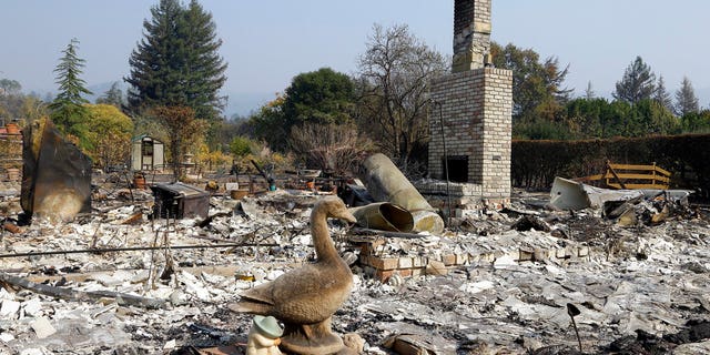 Remains of a home destroyed by wildfires is seen on Wednesday, Oct. 18, 2017, in Glen Ellen, Calif. California fire officials have reported significant progress on containing wildfires that have ravaged parts of Northern California. (AP Photo/Ben Margot)