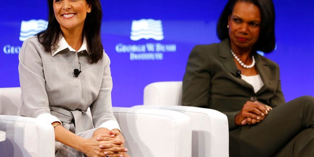 U.S. Ambassador to the United Nations Nikki Haley, left, and former U.S. Secretary of State Condoleeza Rice participate in a panel discussion at a forum sponsored by the George W. Bush Institute in New York, Thursday, Oct. 19, 2017. (AP Photo/Seth Wenig)