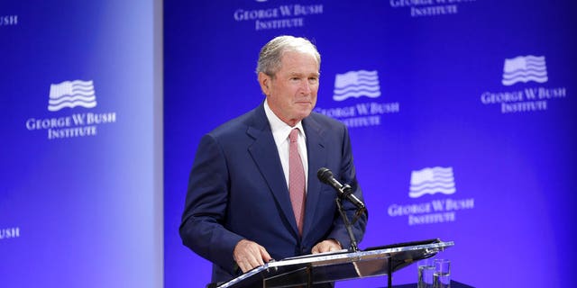 Former U.S. President George W. Bush speaks at a forum sponsored by the George W. Bush Institute in New York, Thursday, Oct. 19, 2017. (AP Photo/Seth Wenig)