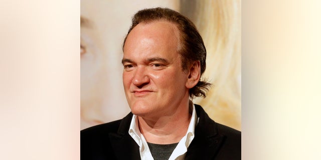 FILE - In this Oct. 8, 2016 file photo, director Quentin Tarantino poses for photographers at the opening ceremony of the 8th Lumiere Festival, in Lyon, central France. Tarantino says he knew about a few instances of improper conduct by producer Harvey Weinstein and wishes he had done more. Speaking to The New York Times in an interview published Thursday, Oct. 19, 2017, Tarantino expressed remorse for not having taken responsibility at the time. He says he knew first hand of Weinsteinâs conduct toward actress Mira Sorvino and another he declined to name. Sorvino and Tarantino were dating at the time. (AP Photo/Laurent Cipriani, File)