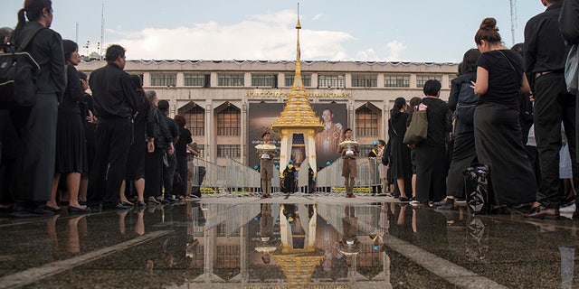 The ceremony was watched in person by tens of thousands of mourners dressed all in black and millions more around the kingdom in broadcasts aired live on most Thai TV stations.