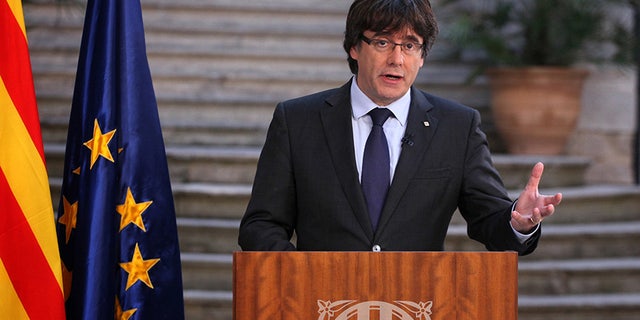 Carles Puidgemont, the ousted Catalan leader, called for peaceful protests amid Spain's action to disband the regional government.
