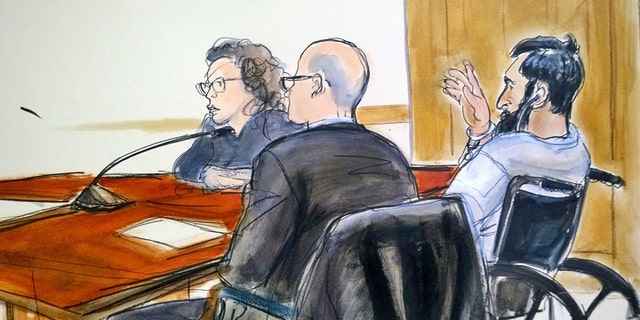 In this courtroom drawing, defendant Sayfullo Saipov, right, addresses the court during his arraignment on federal terrorism charges.