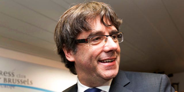 Ousted Catalan President Carles Puigdemont reportedly turned himself in to police in Brussels on Sunday.
