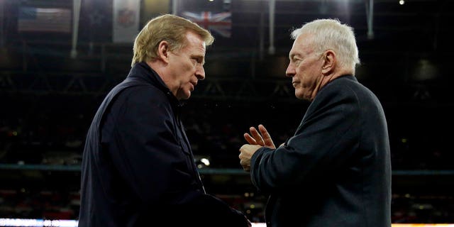 Dallas Cowboys owner Jerry Jones, right, has threatened to sue the NFL if negotiations regarding Goodell’s, left, contract extension are finalized without approval from all NFL team owners.