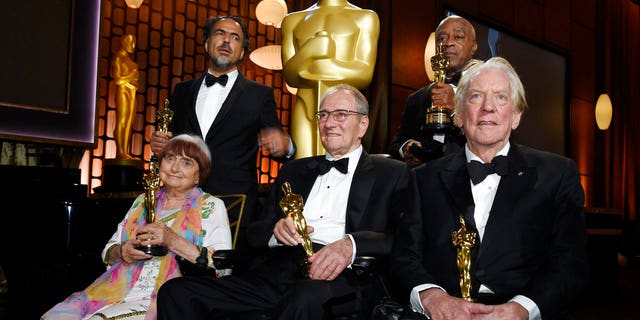 2017 Governors Awards honorees Agnes Varda, Alejandro Gonzales Inarritu, Owen Roizman, Charles Burnett and Donald Sutherland pose with their Oscars following a ceremony at The Ray Dolby Ballroom.