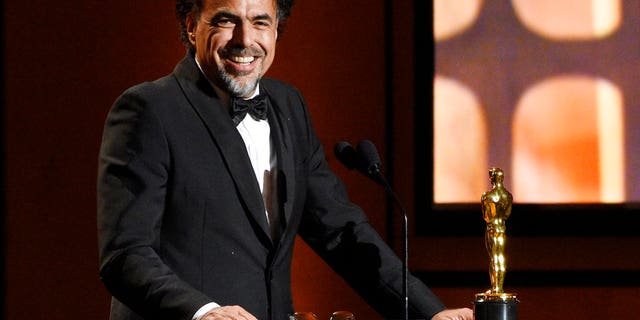 Mexican director Alejandro Gonzalez Inarritu accepts a Special Award Oscar for his virtual reality installation "Carne y Arena.