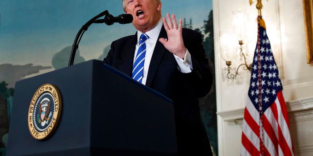 President Donald Trump speaks in the Diplomatic Reception Room of the White House, Wednesday, Nov. 15, 2017, in Washington. (AP Photo/Evan Vucci)