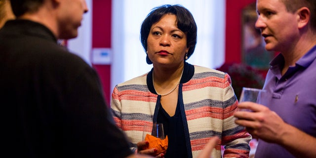 Democrat LaToya Cantrell, center, listens to campaign donors, Sept. 22, 2017.