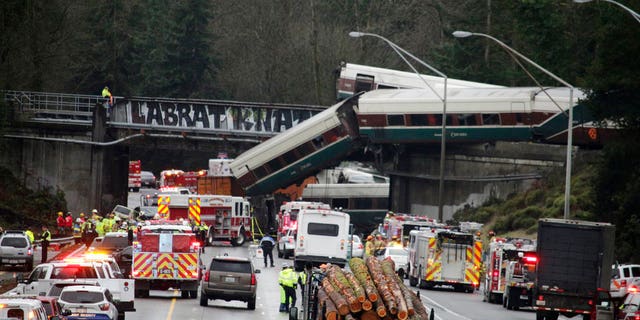 Washington State Trooper Brooke Bova said 12 train cars and two engines jumped the tracks, and thirteen total cars were derailed.