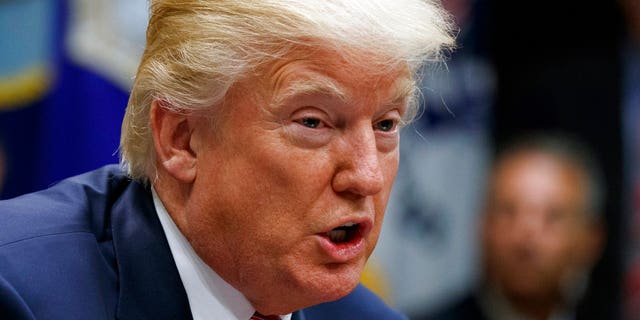 Then-President Donald Trump speaks during a meeting in the Roosevelt Room of the White House in Washington, Oct. 31, 2017.