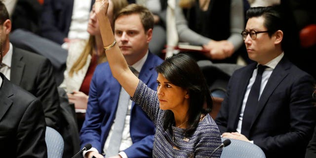 U.S. Ambassador to the United Nations Nikki Haley votes in favor of a resolution proposing sanctions against North Korea, Dec. 22, 2017.