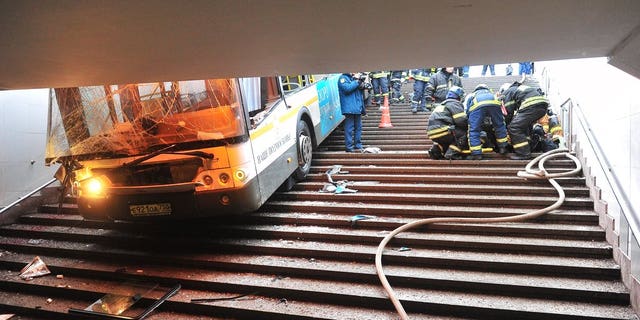 Several people were killed and more than a dozen injured when a bus drove into an underground passageway in Moscow.