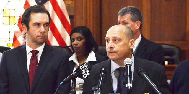 Jersey City Police Chief Michael Kelly, right, spoke at a press conference Friday morning in Jersey City, N.J., regarding Jersey City Police Lt. Christopher Robateau who was was killed on the New Jersey Turnpike early Friday morning. Seen to his left is Jersey City Mayor Steve Fulop.