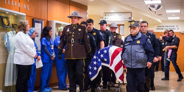 The Pierce County Sheriff's Office said McCartney was responding to a home invasion in the Frederickson area, late Sunday night when he was shot during a foot chase.