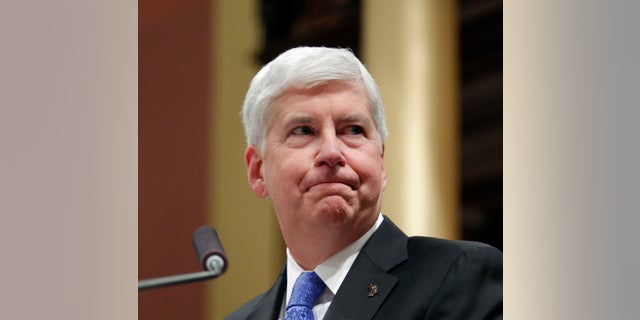 Former Michigan Gov. Rick Snyder's membership in a state accountants' group had no bearing on his pardon of a fellow accountant, the group claims (Associated Press)