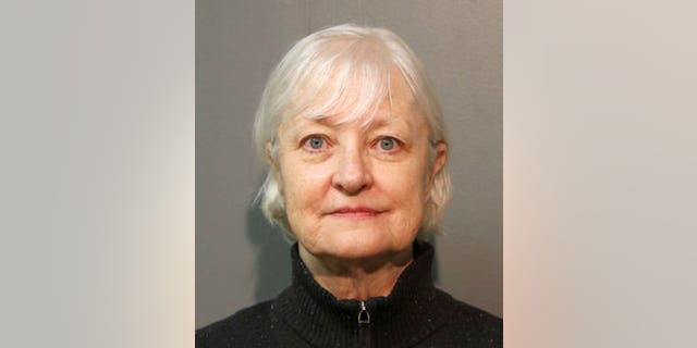 In this Jan. 2018, photo provided by the Chicago Police Department, Marilyn Hartman is seen posing for a mugshot in Chicago. (Chicago Police Department via AP)