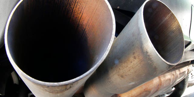 In this Aug. 2, 2017, file photo, the exhaust pipes of a VW diesel car can be seen in Frankfurt. The chairman of Volkswagen says that diesel exhaust tests involving monkeys were "totally incomprehensible," and that the matter must be "investigated fully and unconditionally."