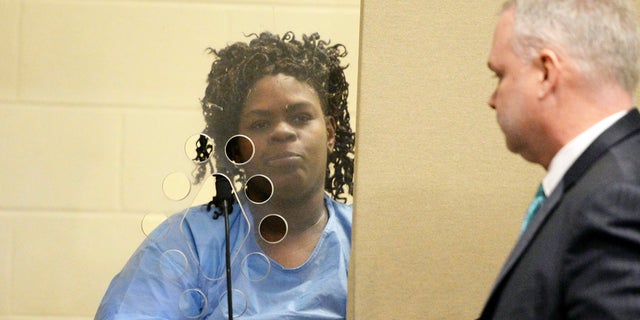 Latarsha Sanders, 43, was arraigned Tuesday on two counts of murder.