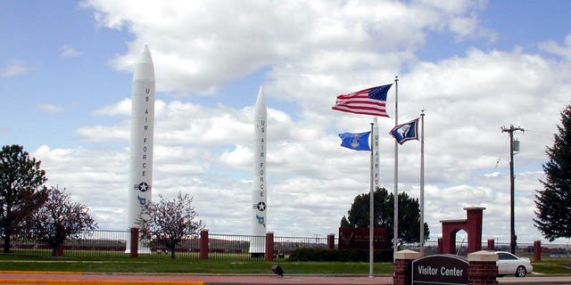 Three types of missiles flank the main gate of F.E. Warren Air Force Base, Wyoming.