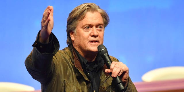 Former White House strategist Steve Bannon addresses members of the French far-right National Front at a party congress in Lille, France, March 10, 2018.