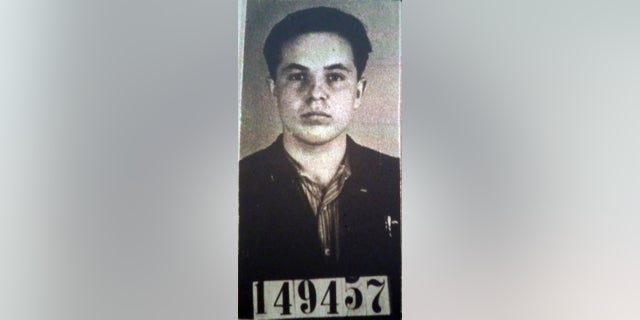 FILE - This Undated file photo of Michael Karkoc was part of his application for German citizenship filed with the Nazi SS-run immigration office on Feb. 14, 1940. Polish prosecutors say American authorities are moving ahead with their request to extradite a 99-year-old Minnesota man to be tried on allegations he was involved in a World War II massacre of civilians. (AP Photo/U.S. National Archives, File)