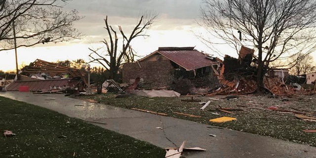 Severe storms that spawned tornadoes damaged homes and downed trees as they moved across the Southeast on Monday night.