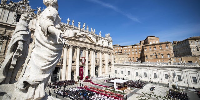 A view of St. Peter's Square filled with faithful as Pope Francis celebrates a Palm Sunday Mass, at the Vatican. (AP Photo/Andrew Medichini)
