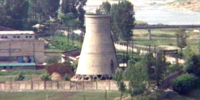 In this June 27, 2008, file photo from television, the 60-foot-tall cooling tower, which was later dismantled, is seen at the main Yongbyon nuclear reactor complex in Yongbyon, North Korea.