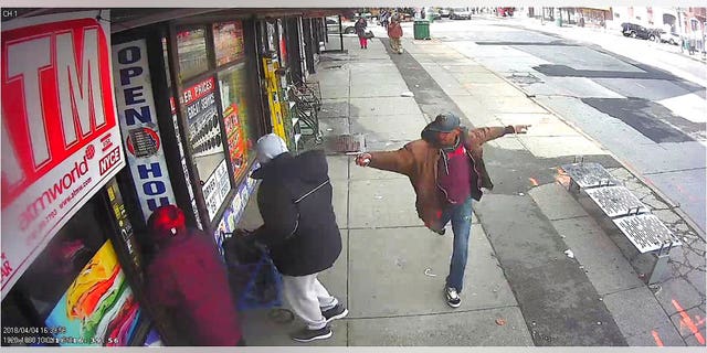Surveillance video from April 5, 2018, shows Saheed Vassell brandishing a metal object before being fatally shot by police.