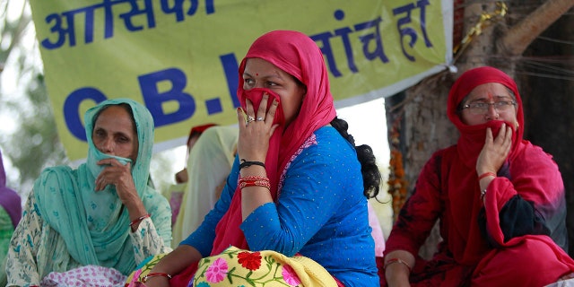 Village women sit on a hunger strike demanding that the investigation into the rape and murder of 8-year-old girl Asifa be handed over to the Central Bureau of Investigation (CBI), claiming that the six Hindu men accused in the attack had been framed and that the police investigation was flawed, in Kathua, India.