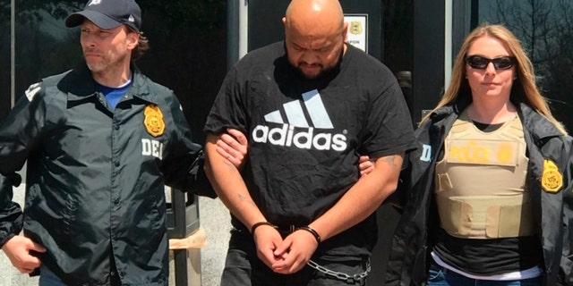 Miguel Angel Corea Diaz, center, the alleged East Coast leader of MS-13, will face murder conspiracy and drug-trafficking charges in New York.