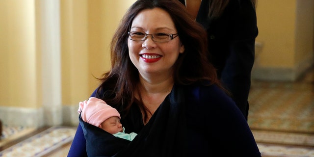 The 10-day-old baby was the first infant to appear in the chamber.