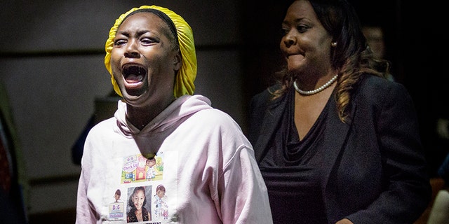 Jasmine Mateen, mother of bus crash victim Zyaira Mateen, shouts as she is escorted from the courtroom during a sentencing hearing for Walker on Tuesday.