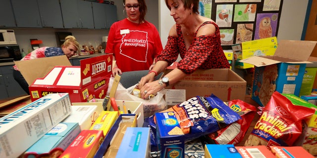 While teachers are on strike, many, including those pictured here, have donated food or worked with charities to ensure students can still receive a meal even while school isn't in session.