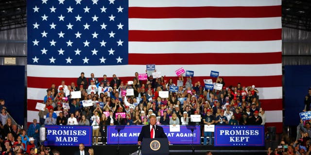 President Donald Trump speaks during a campaign-style rally in Washington, Mich., April 28, 2018.