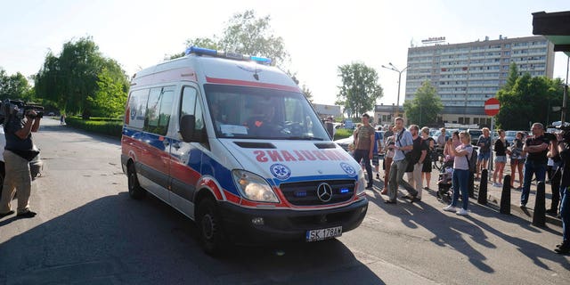 An ambulance arrives after an earthquake at the Zofiowka coal mind in Jastrzebie-Zdroj in southern Poland.