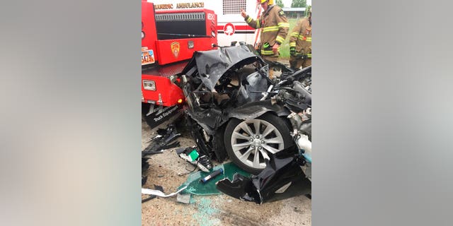 Sgt. Samuel Winkler said the car's air bags were activated and that the Tesla's 28-year-old driver suffered a broken right ankle, while the driver of the mechanic truck didn't require treatment.