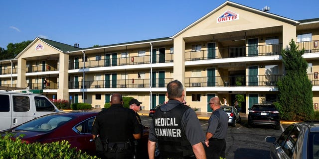 Three Georgia police officers were sickened by an unknown chemical when they entered a motel room with a dead body inside.