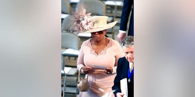 Oprah Winfrey arrives at St. George's Chapel at Windsor Castle for the wedding of Meghan Markle and Prince Harry.