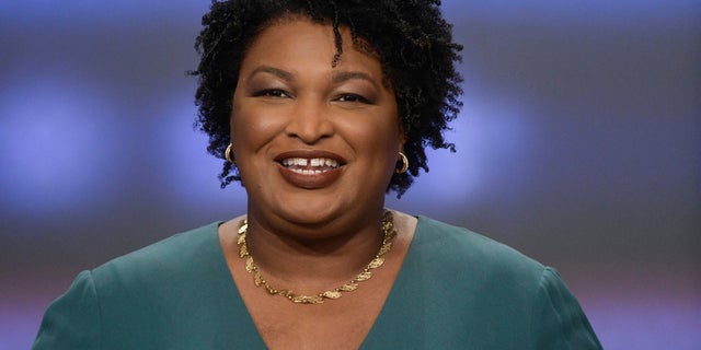 In this May 20, 2018, photo, Georgia Democratic gubernatorial candidate Stacey Abrams participates in a debate against Stacey Evans in Atlanta. In Georgia, black women will likely factor into one of the country's marquee political contests. The Democratic race for governor features two women, and candidate Abrams is running to become the first black woman ever elected governor in America. (AP Photo/John Amis)