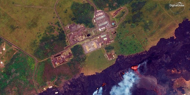 Satellite photo provided by DigitalGlobe shows lava coming out of fissures caused by Kilauea volcano, near Puna Geothermal Venture, a geothermal energy plant.