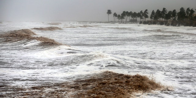 Cyclone Mekunu blew into the Arabian Peninsula on Saturday, drenching arid Oman and Yemen with rain, cutting off power lines, officials said.
