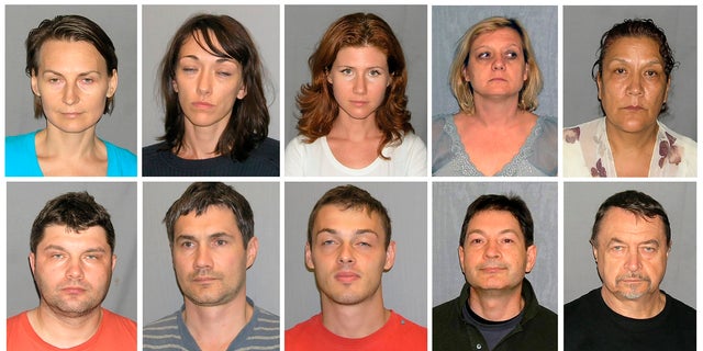 This file photo combo of 10 undated booking photos, provided by U.S. Marshals, includes Tracey Ann Foley, top row second from right, whose real name is Elena Vavilova, after the FBI arrested her and nine others in 2010 for being Russian spies. Also pictured are: from top left, Cynthia Murphy whose real name is Lydia Guryev, Patricia Mills whose real name is Natalia Pereverzeva, Anna Chapman, Vavilova, Vicky Pelaez. Bottom row from left: Richard Murphy born Vladimir Guryev, Michael Zottoli whose real name is Mikhail Kutsik, Mikhail Semenko, Donald Howard Heathfield whose real name is Andrey Bezrukov and Juan Lazaro whose real name is Mikhail Vasenkov.