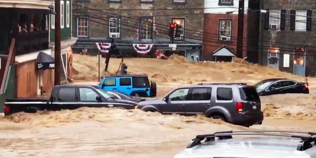 Flash flooding swept away cars in Ellicott City in Maryland on Sunday.