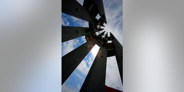 The 93-foot-tall tower is being installed near the park's entrance and will feature 40 tubular metal wind chimes, one each for the 33 passengers and seven crew members who died.