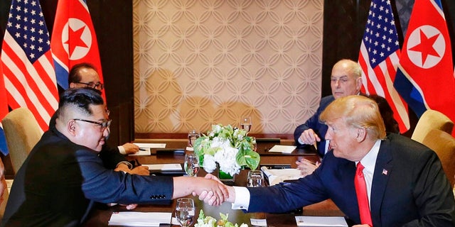 President Trump said sanctions on North Korea will remain for now.