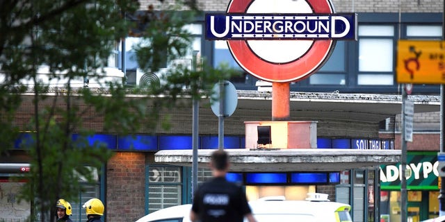 Emergency services attend the scene of a small explosion at Southgate Underground station in London.